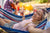Women celebrating National Hammock Day with a hammock in the great outdoors