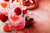 Roses julep Valentine's day cocktail with red roses and hearts on a festive background