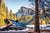 Man in a hammock enjoying the picturesque winter landscape of Half-dome, Yosemite national park