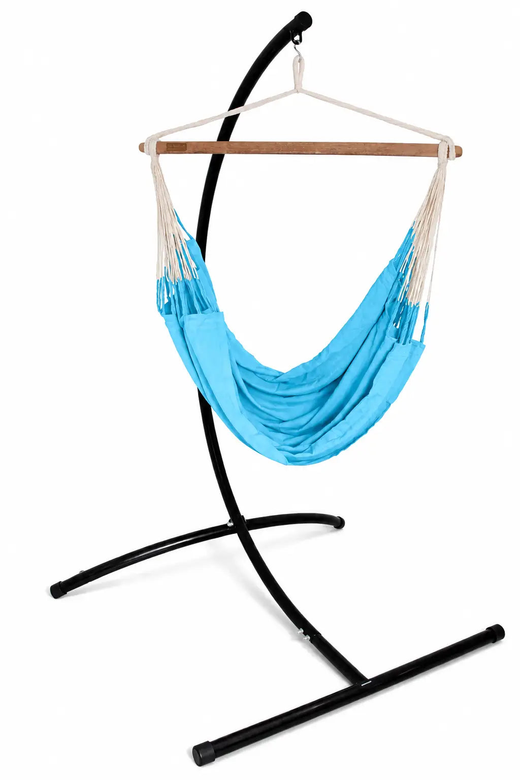 A bright blue fabric hammock suspended from a natural wood spreader bar on a black metal stand, isolated on a white background.