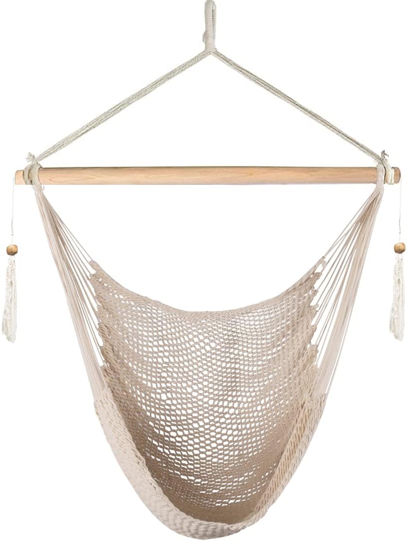 Beige hammock chair with wooden rod on a white background