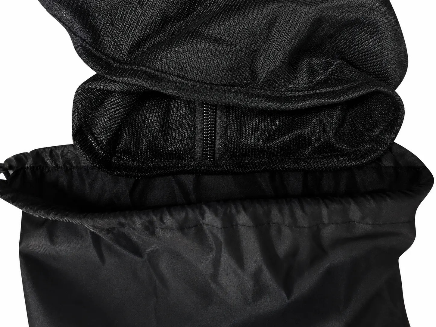 Close-up of a black hooded jacket with a reflective surface